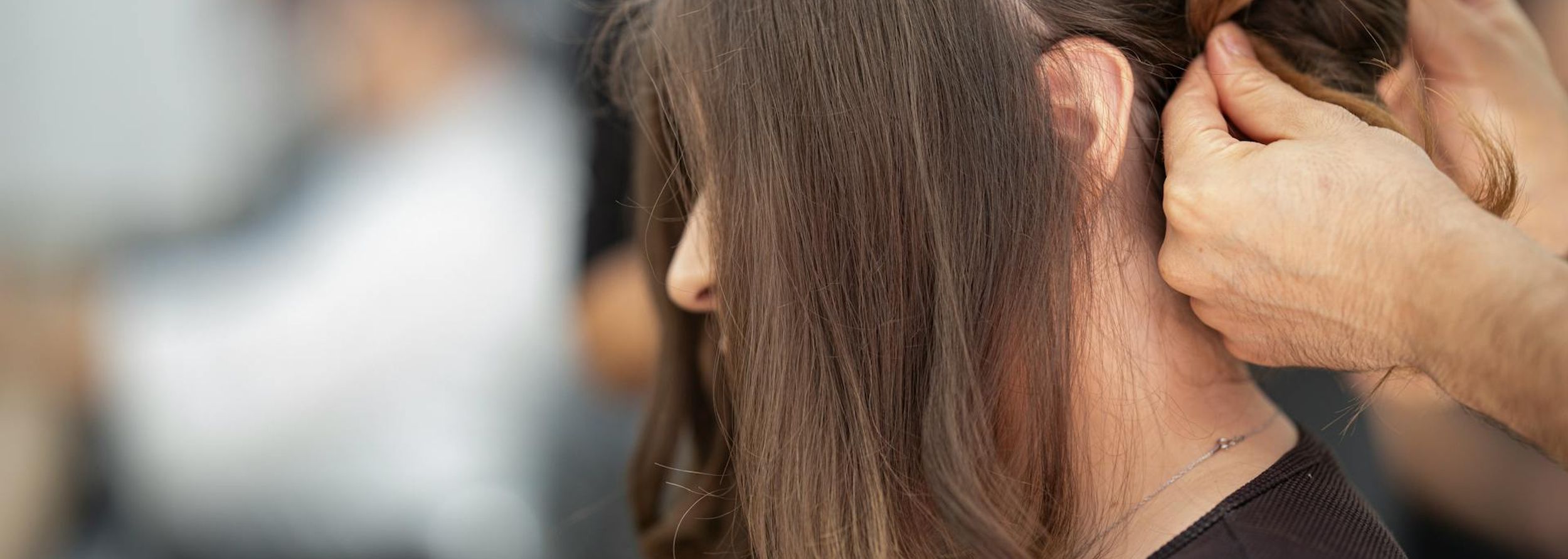 Someone getting their hair washed